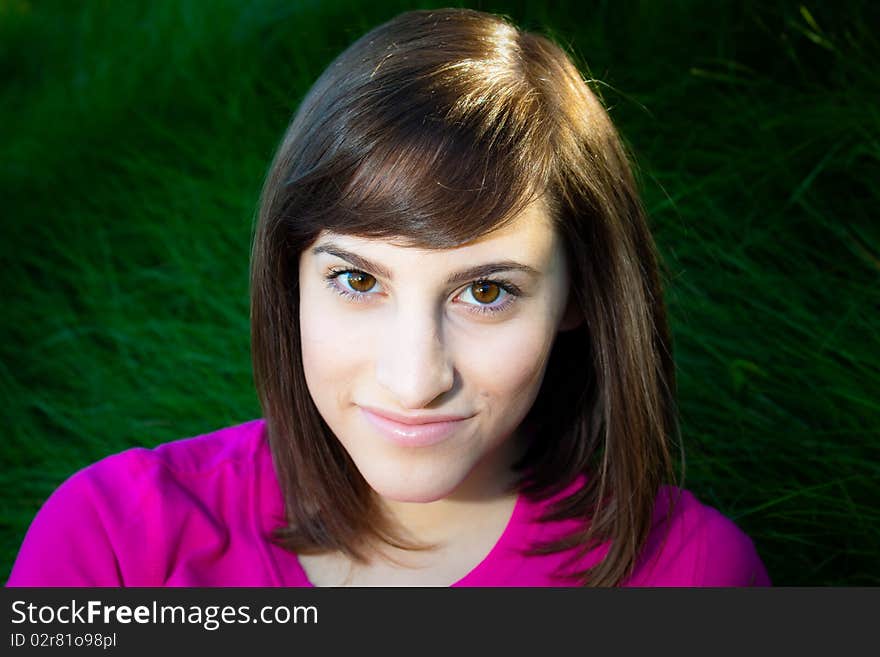 A Lovely Young Women Smiling Into The Camera