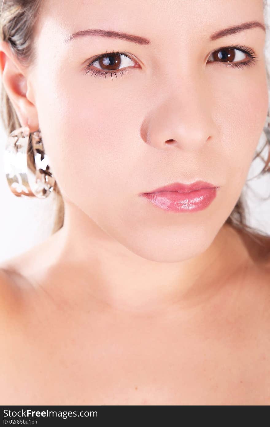 Woman looking at the camera over white background. Woman looking at the camera over white background