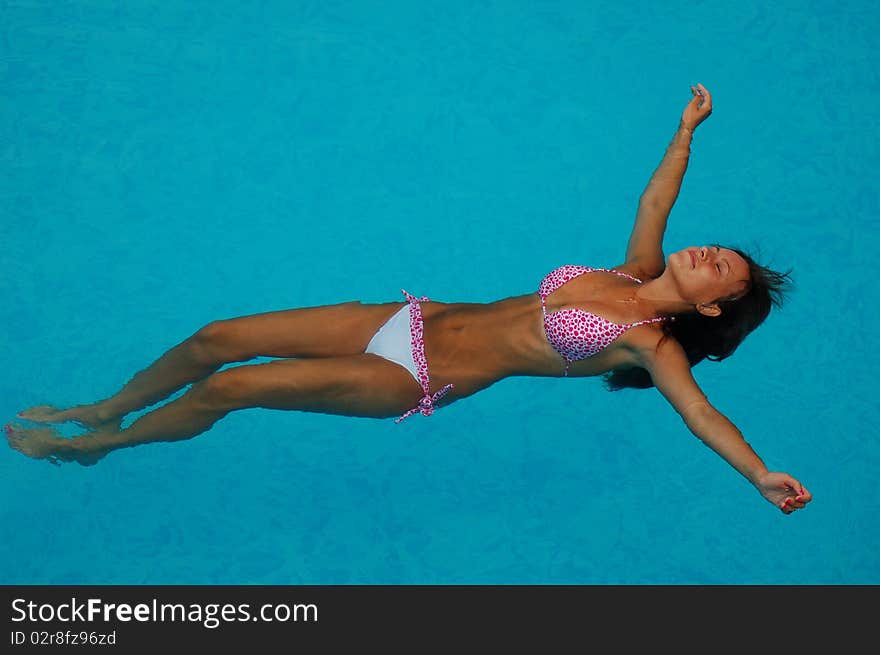 Relax In A Swimming Pool