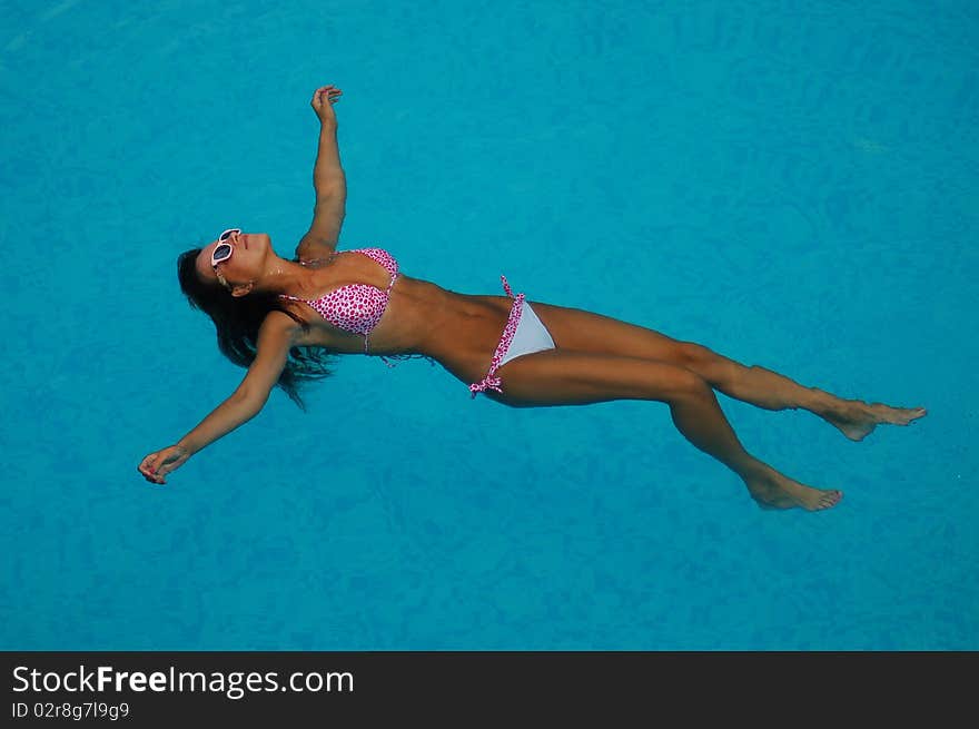 Relax In A Swimming Pool