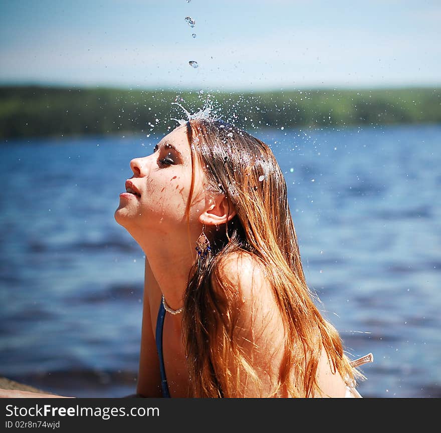 Adult person enjoys blue water. Adult person enjoys blue water