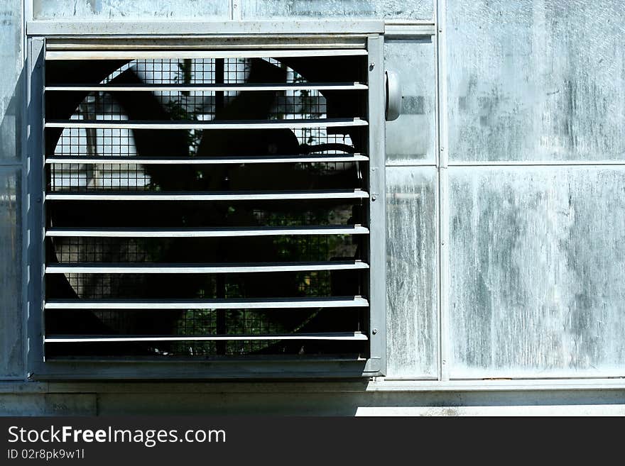 A green house fan close up. A green house fan close up