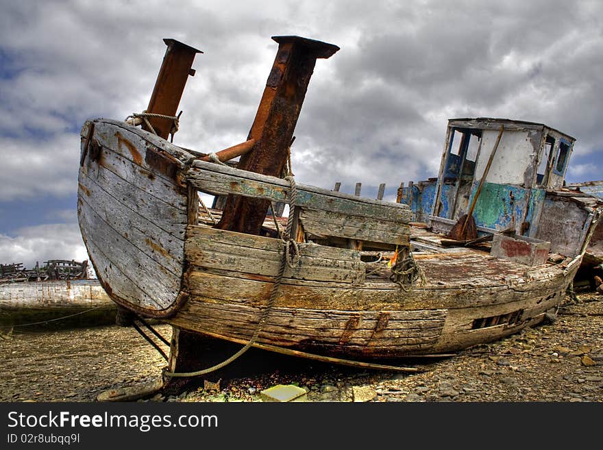 A boat in a marine cemetery in Rostellec in Britain in France. A boat in a marine cemetery in Rostellec in Britain in France