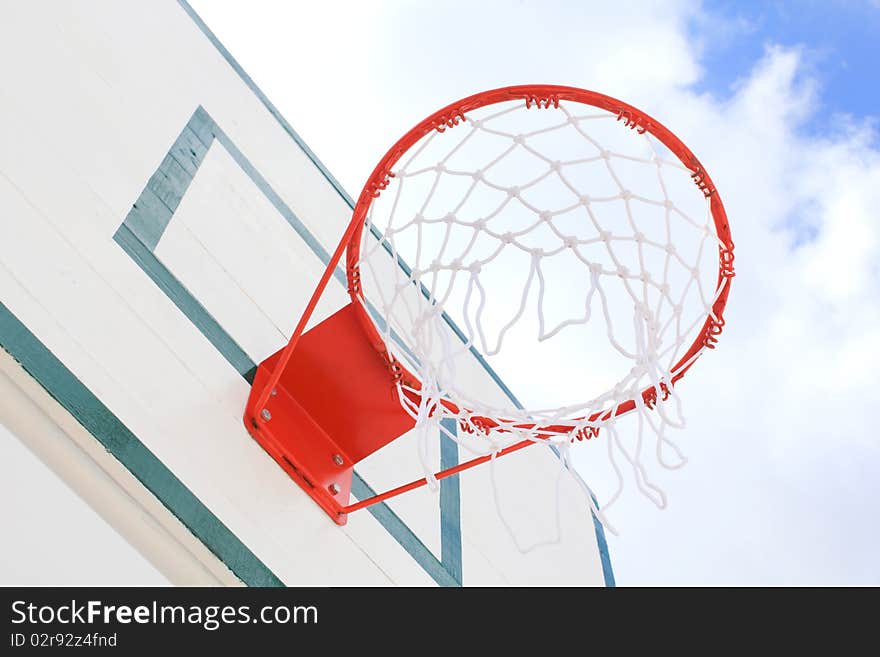 Basket hoop over the blue sky. Basket hoop over the blue sky