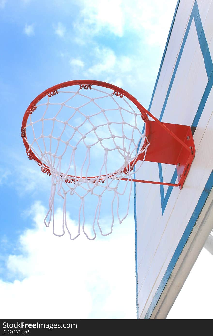 Basket hoop over the blue sky. Basket hoop over the blue sky