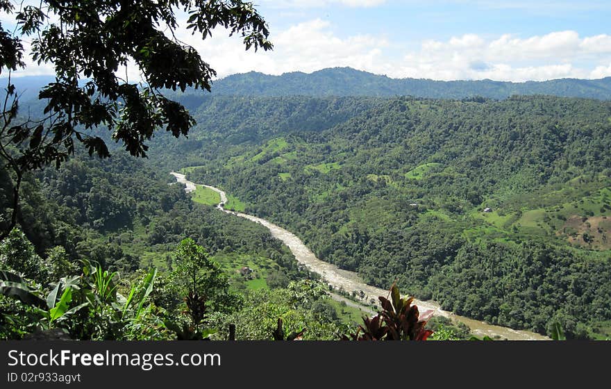 A beautiful mountain scene showing  tropical vegetation and view of the Rio Blanco,Ecuador. A beautiful mountain scene showing  tropical vegetation and view of the Rio Blanco,Ecuador