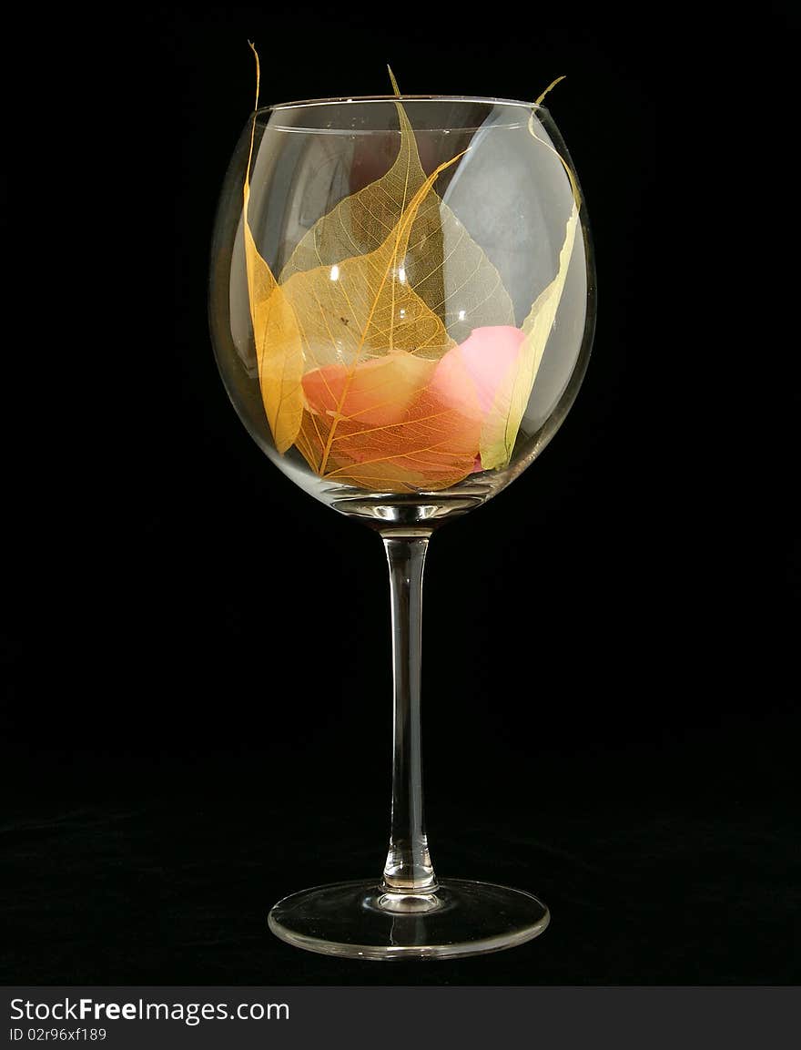 Floral Fantasy of leaves and flower petals in a large glass Fougere