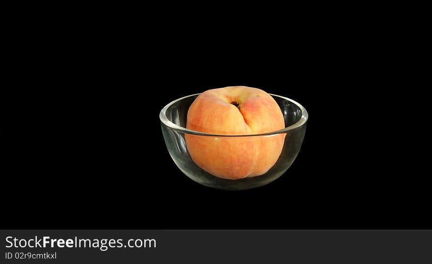 Big ripe peach in a vase