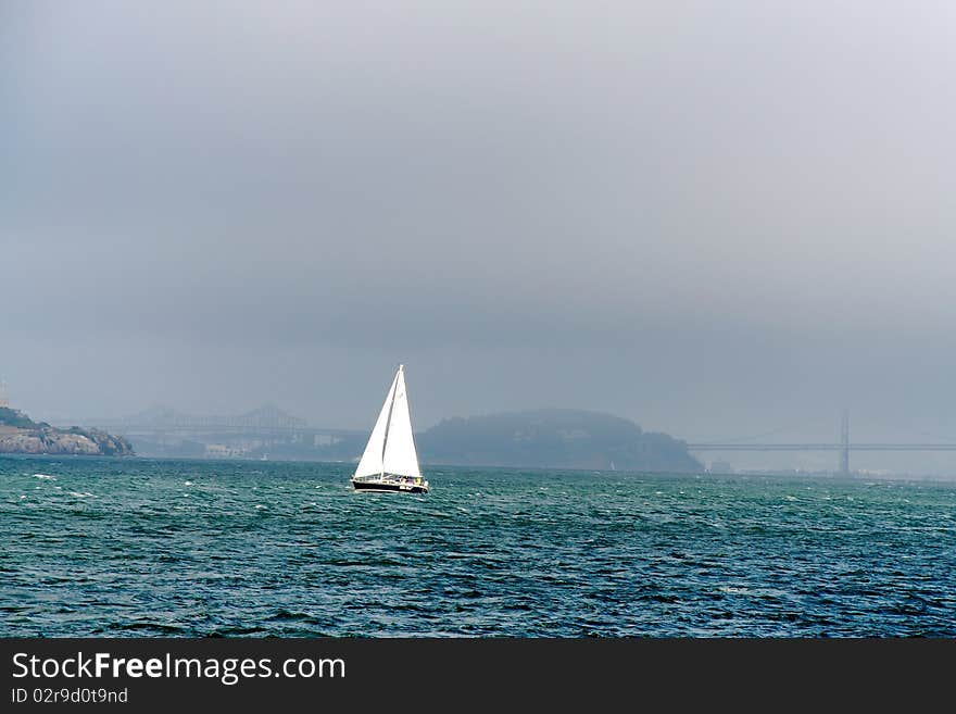 Bay Bridge And Sailboat