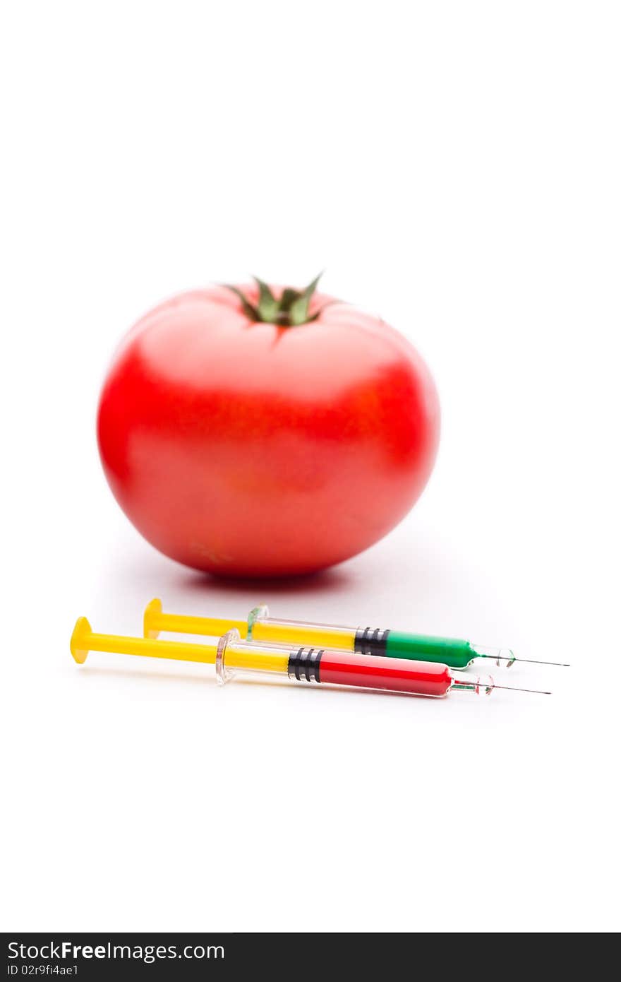 Syringe Red nad Green Liquid with Tomatoes