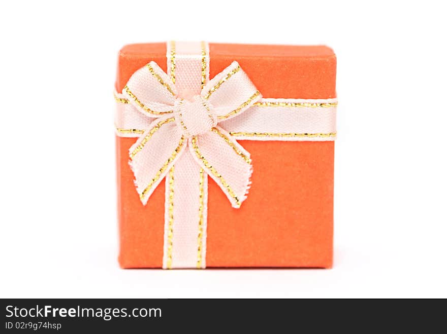 Orange gift box isolated on white