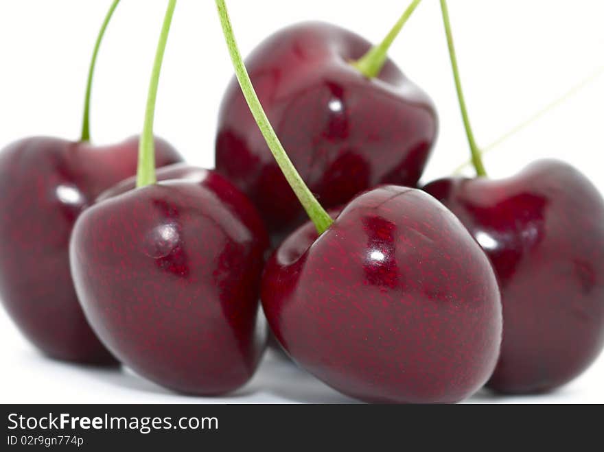 Cherries closeup isolated on white