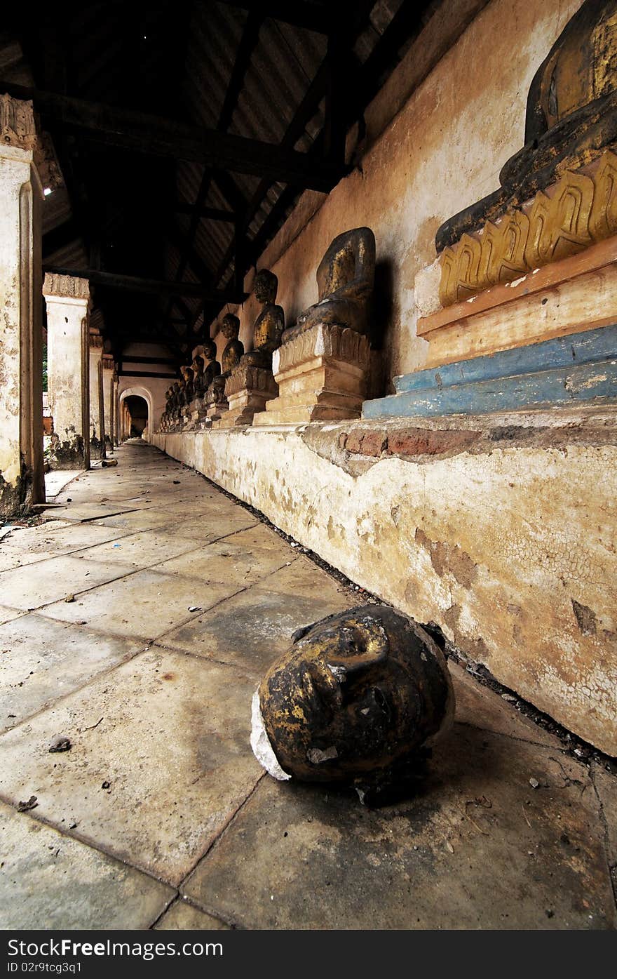 Head of Buddha image is damange in old temple , Thailand. Head of Buddha image is damange in old temple , Thailand