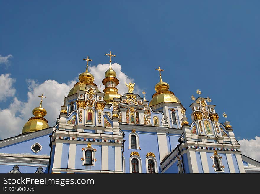 Blue orthodox church with cupolas