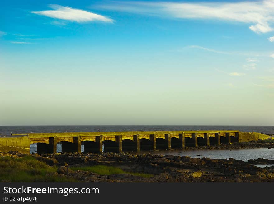 Stoune bridge in olden evening. Uruguay, Montevideo. Stoune bridge in olden evening. Uruguay, Montevideo.