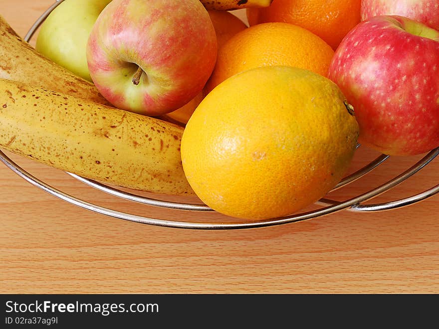 Fruit in a wire basket. Fruit in a wire basket