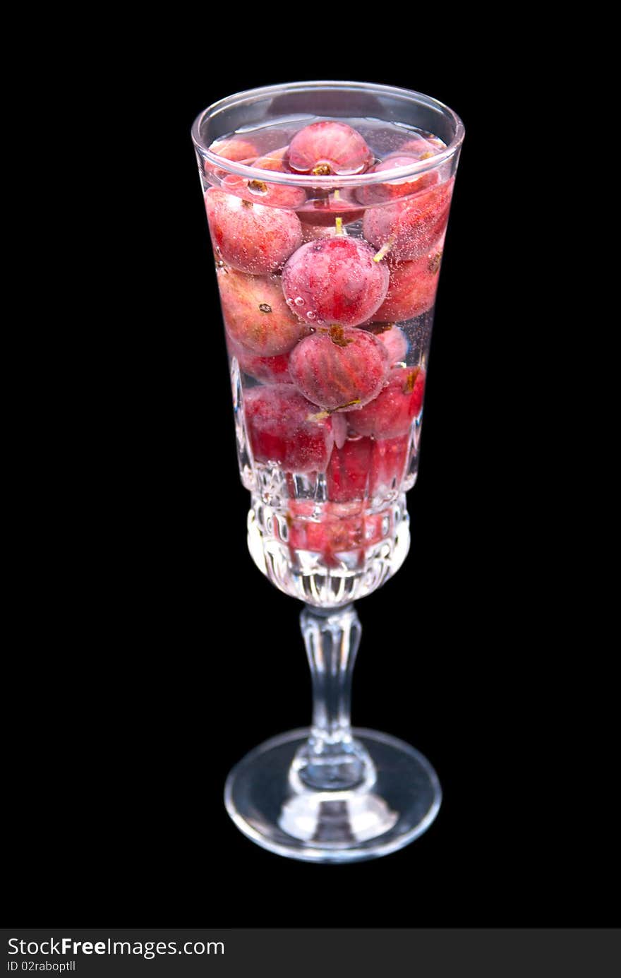 Glass of gooseberries fresh delicious drink