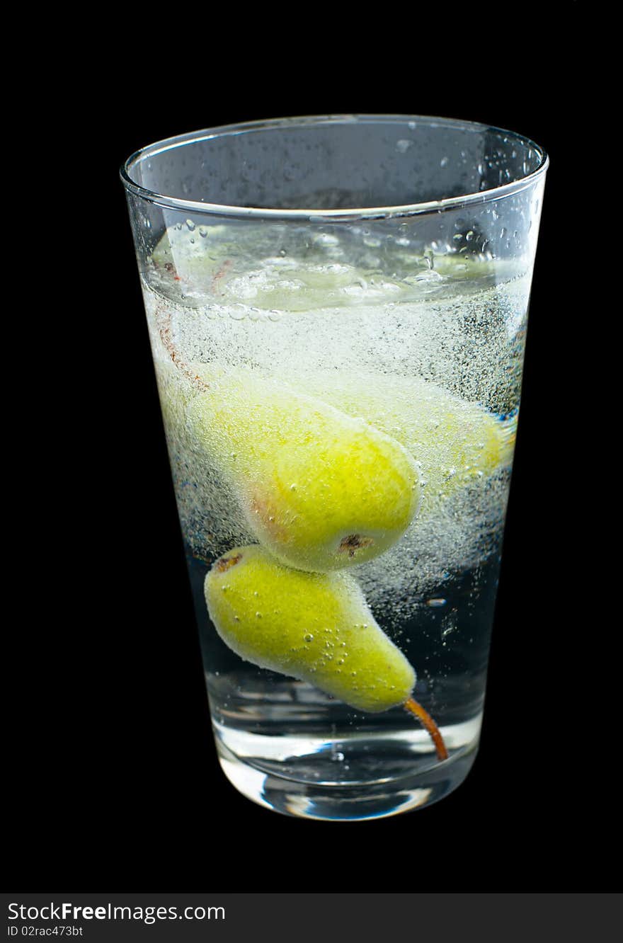 Pear fruit carbonated beverage in glass. Pear fruit carbonated beverage in glass