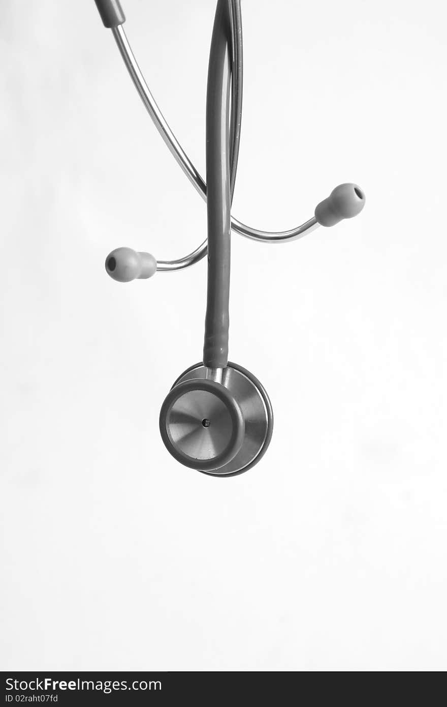 Doctor's stethoscope and chart a patient's heart. Doctor's stethoscope and chart a patient's heart