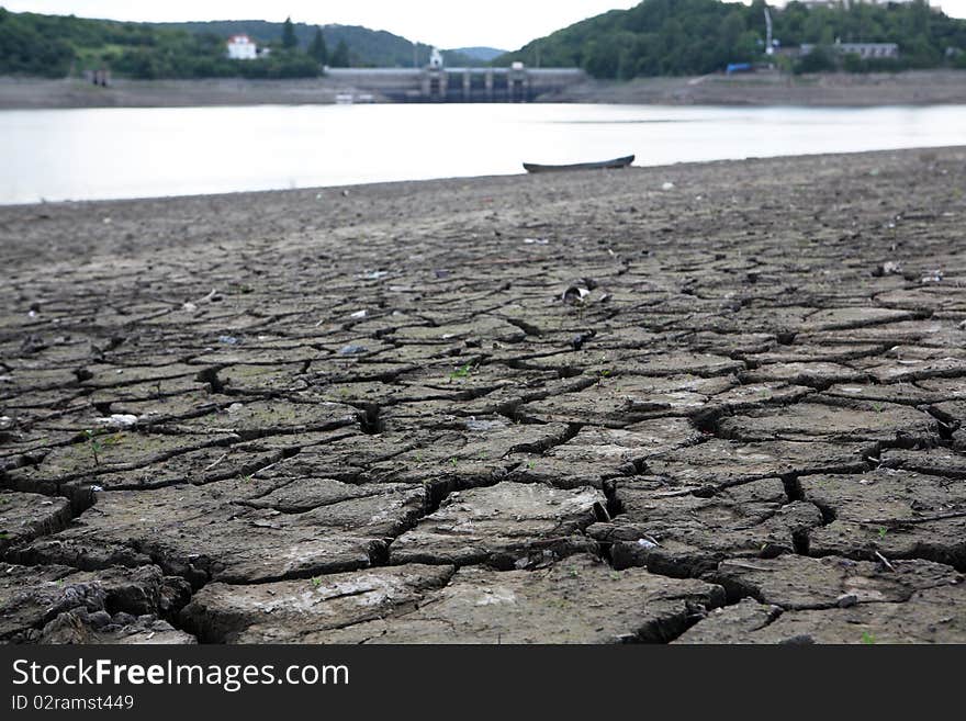 Dried and cracked soil near dam in Brno, Czech republic. Dried and cracked soil near dam in Brno, Czech republic