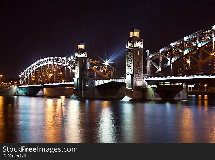 Bolsheohtinskiy bridge at night in St. Petersburg. Russia. Bolsheohtinskiy bridge at night in St. Petersburg. Russia