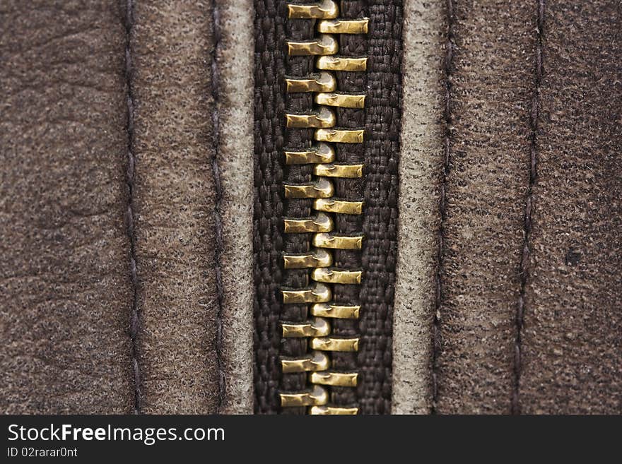 Macro of brown leather with zip