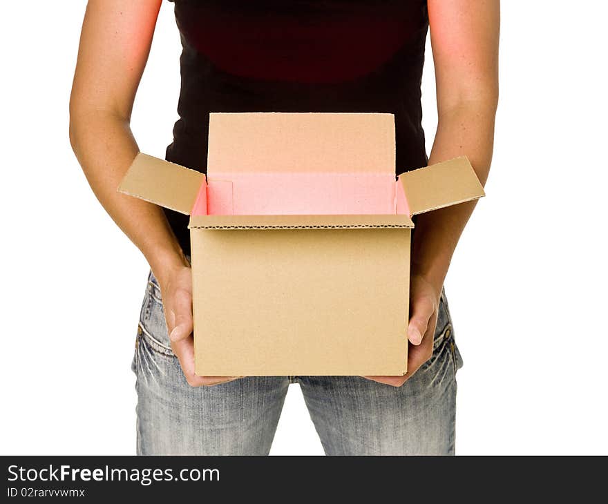 Woman holding a heavy cardboard box isolated on white background. Woman holding a heavy cardboard box isolated on white background