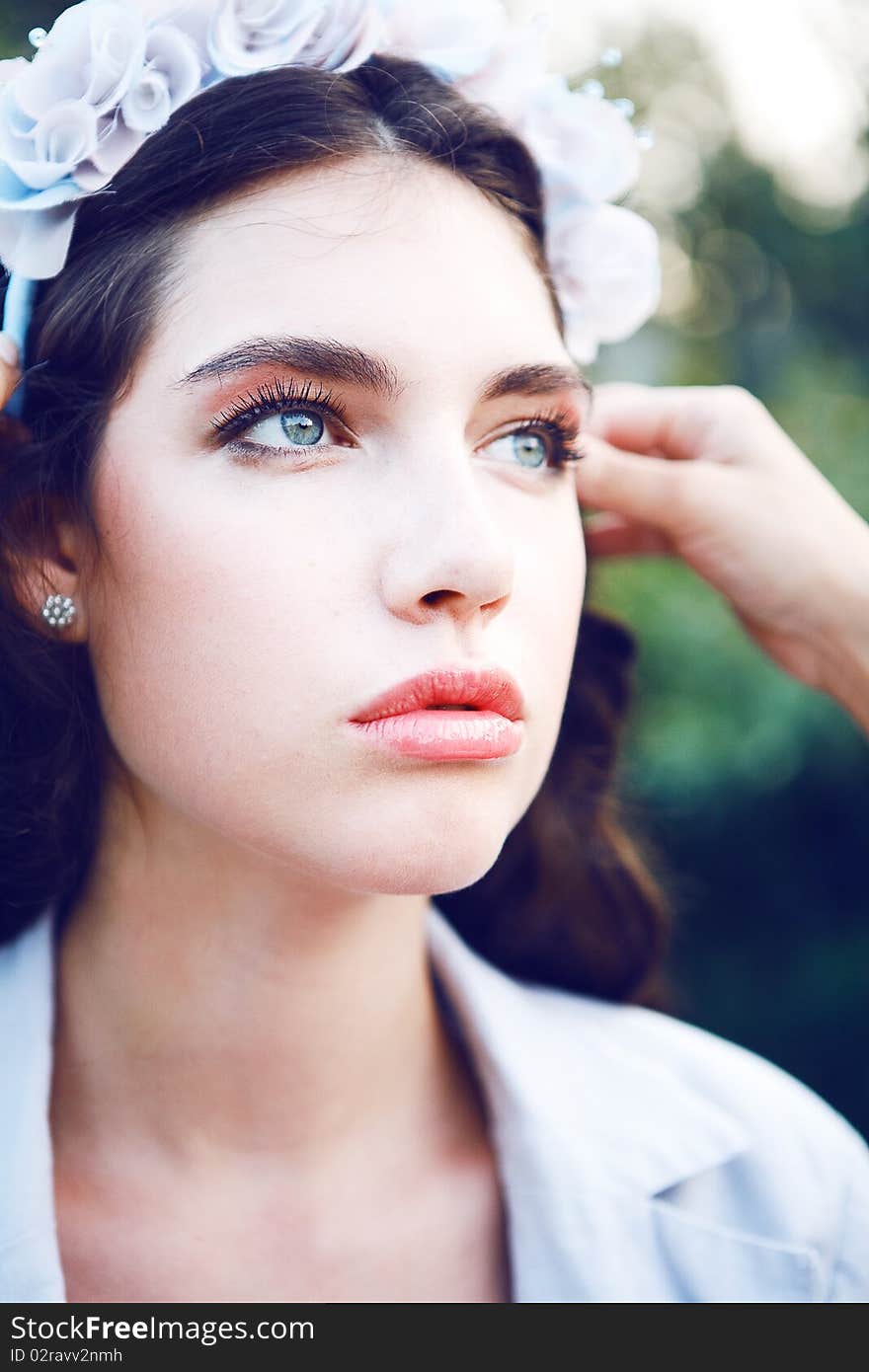 Pretty women in the garden with headband