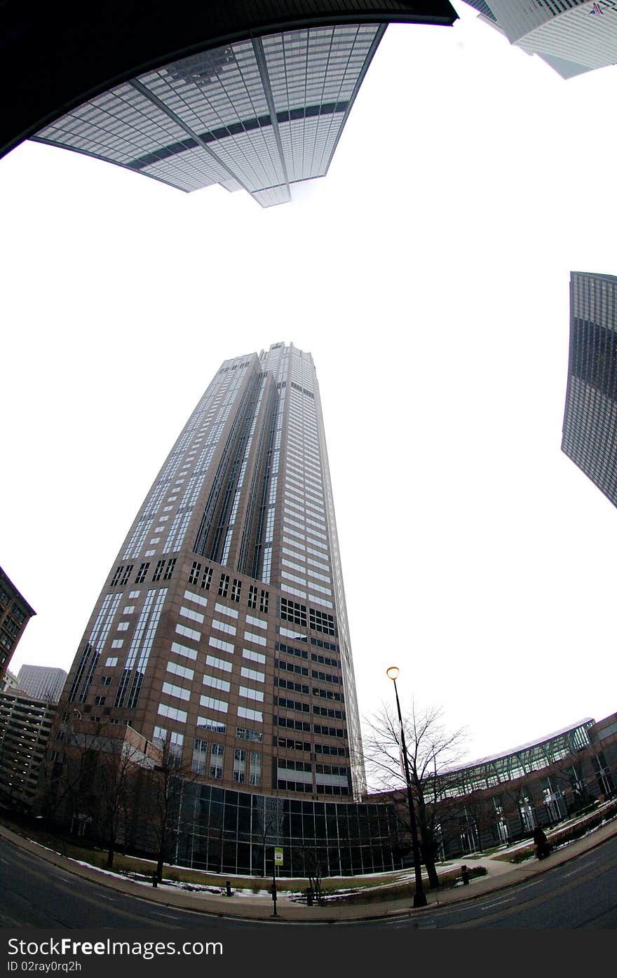 Fish eye view of Chicago skyscraper buildings in winter. Fish eye view of Chicago skyscraper buildings in winter