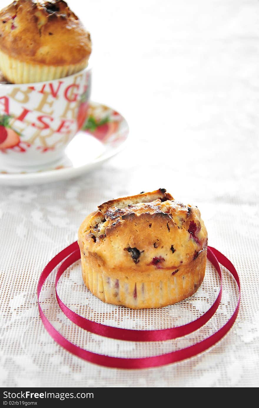 Freshly baked muffins with black currants