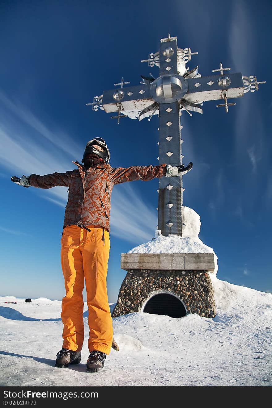 Happy girl in the mountains of the arms are raised up. Happy girl in the mountains of the arms are raised up