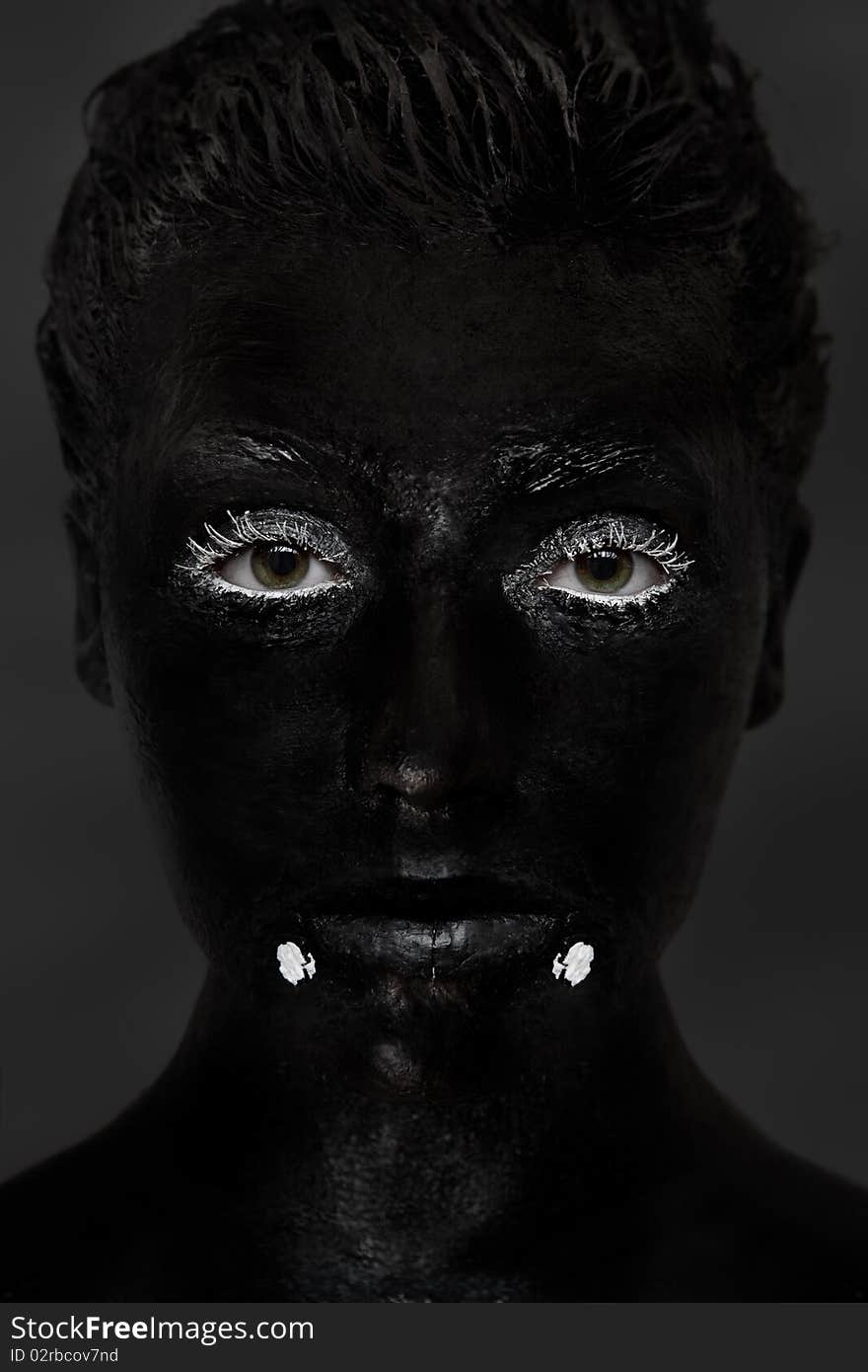 Portrait of a dark painted woman. Portrait of a dark painted woman