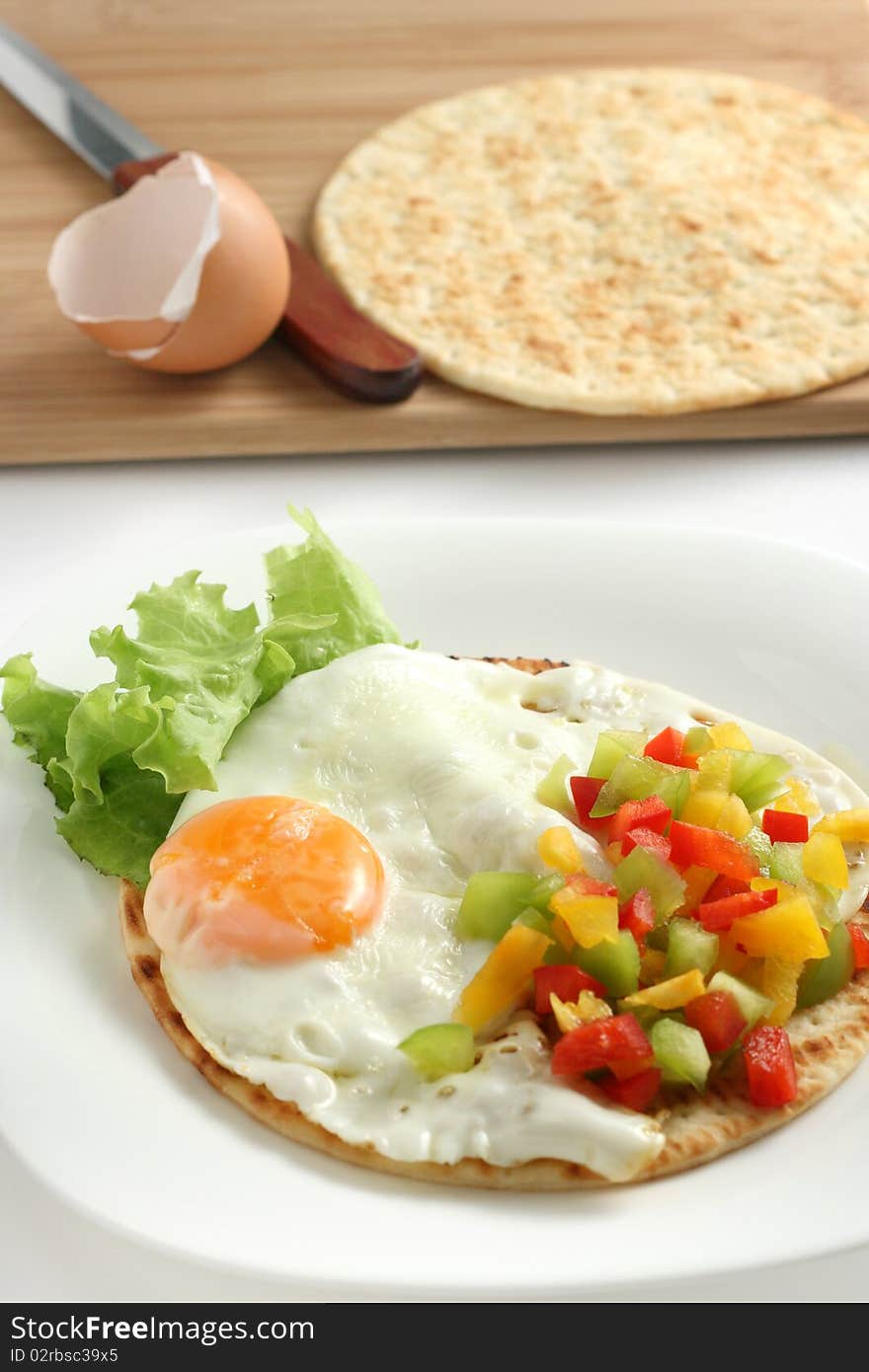 Fried egg with pepper