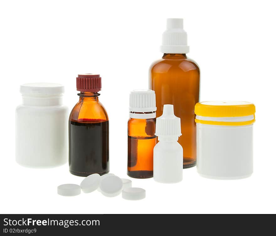 Medical supplies - vial bottles and pills on white background. Medical supplies - vial bottles and pills on white background