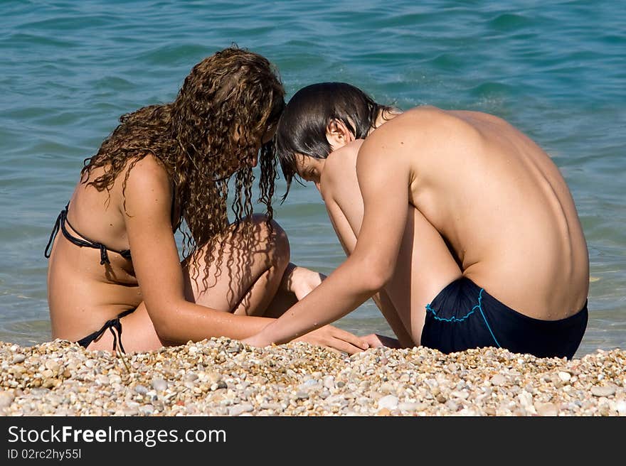 Boy and girl on the beach