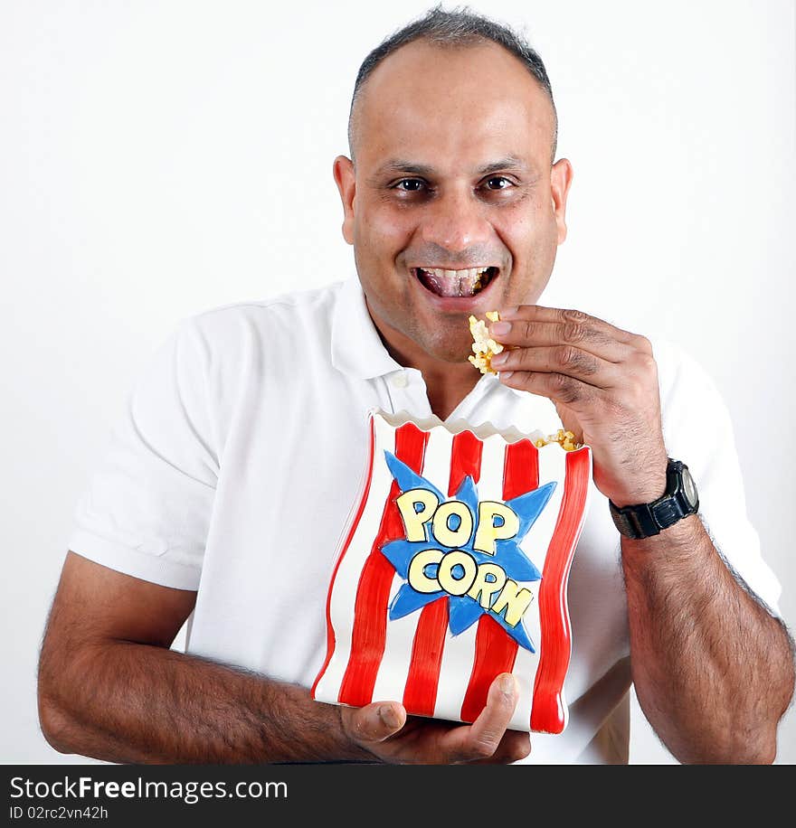 Office worker eating popcorn