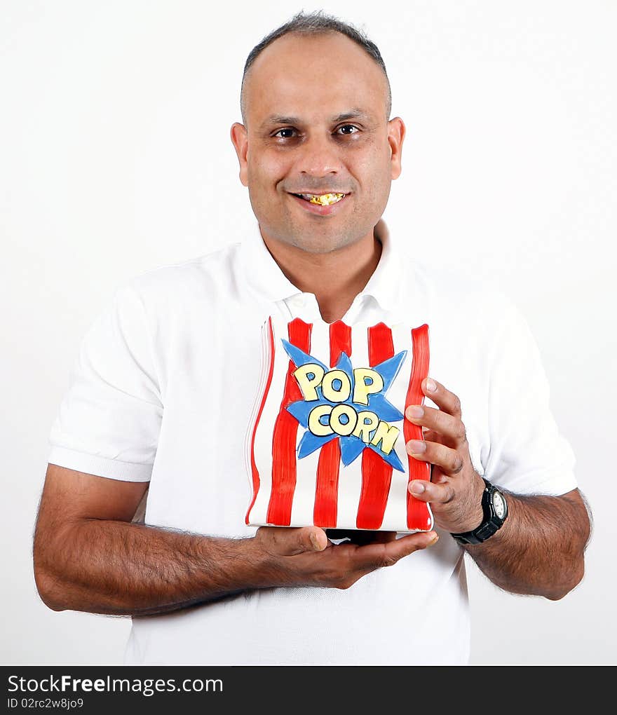 Office worker eating popcorn