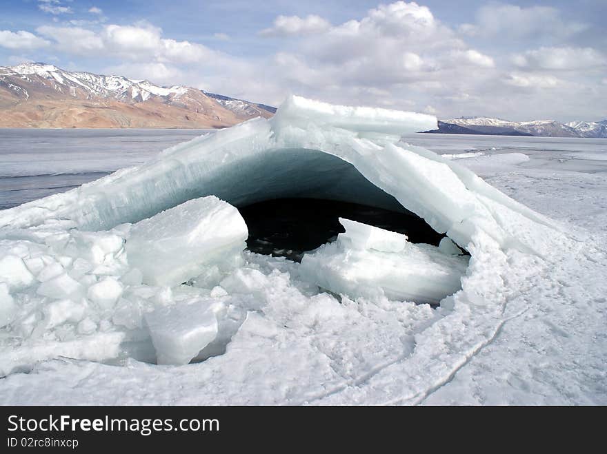 Unique snow formation resembling a shelter