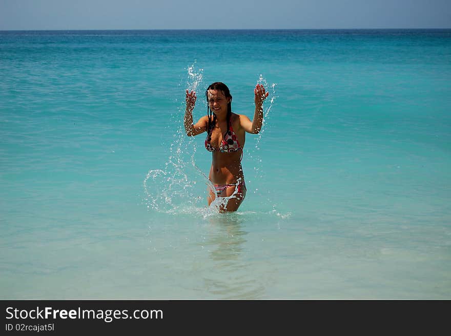 A girl in azure Adriatic waters of Montenegro. A girl in azure Adriatic waters of Montenegro