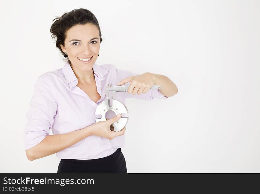 Woman gauging a mechanical seal and smiling. Woman gauging a mechanical seal and smiling