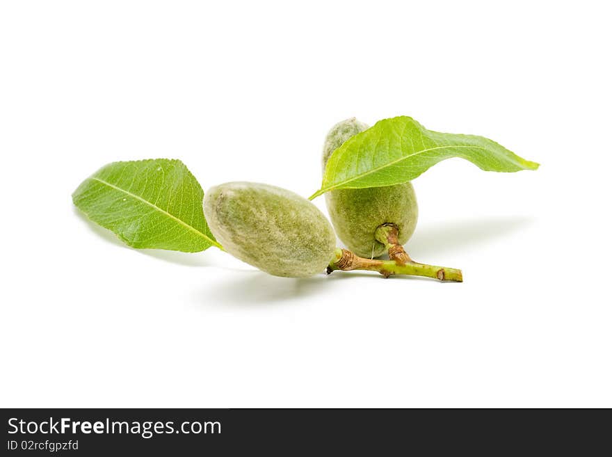 Green almonds isolated on white background