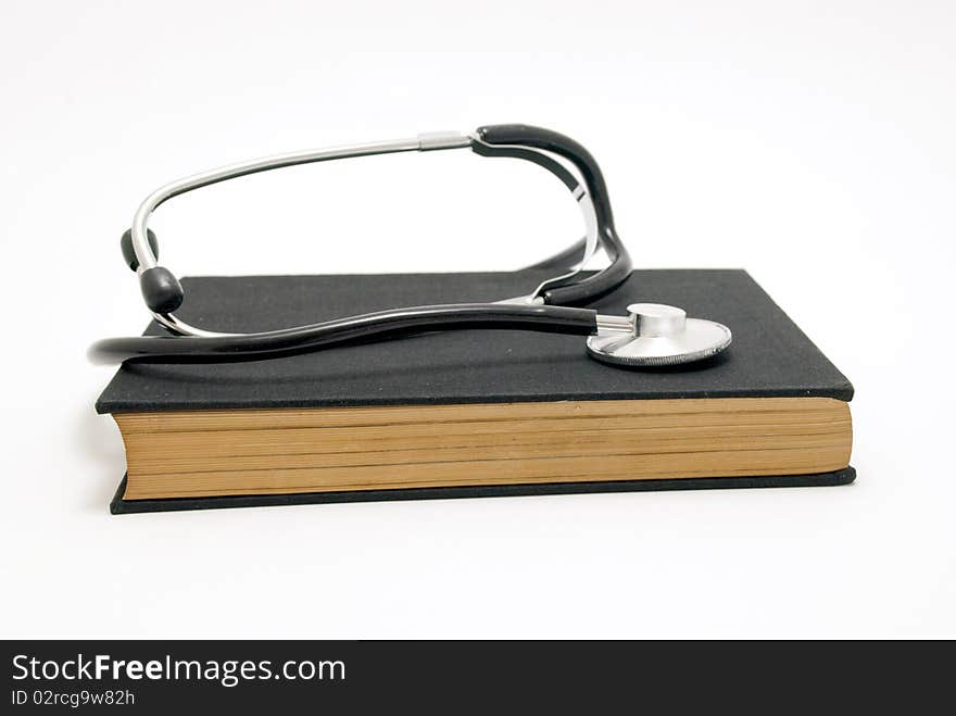 Stethoscope over book