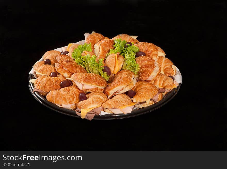 Sandwich food tray on a black background. Sandwich food tray on a black background.