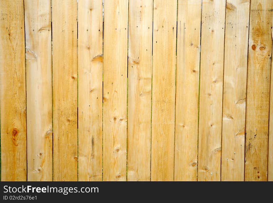 Vertical wooden planks showing texture and grain. For textures, backgrounds and abstract concepts.