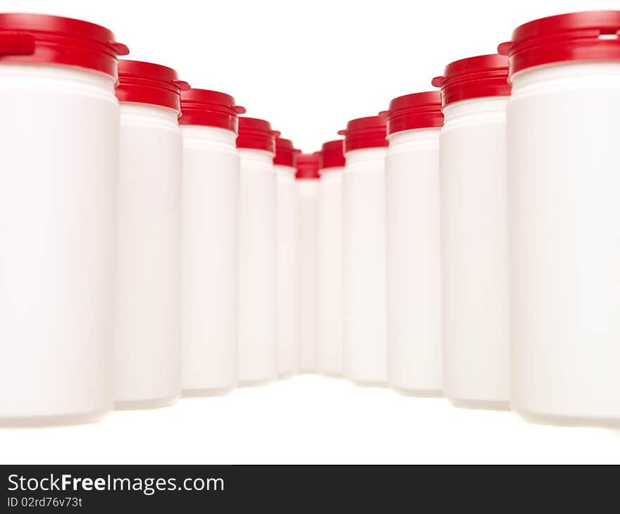 Formation of Plastic cans isolated on white background