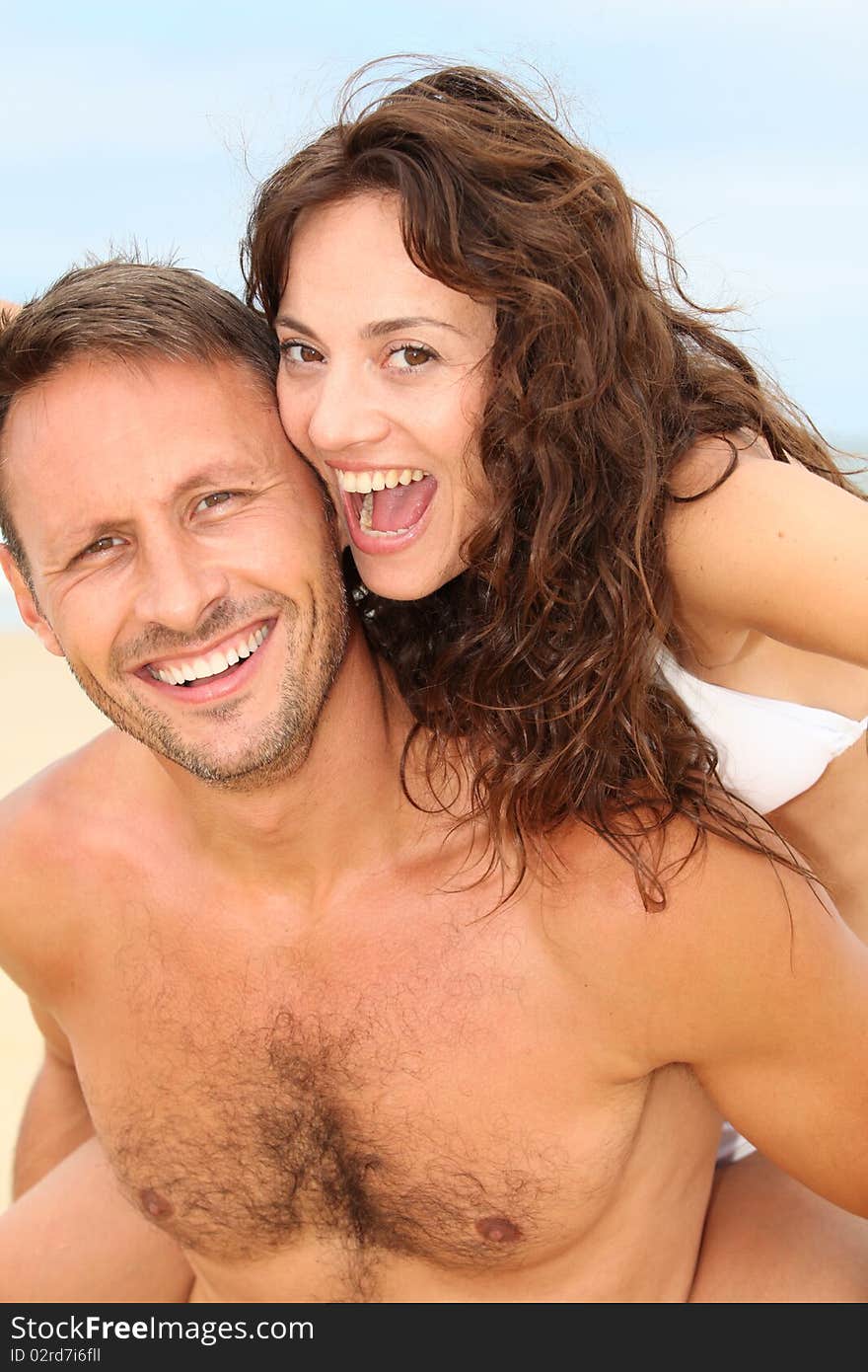 Couple having fun at the beach. Couple having fun at the beach