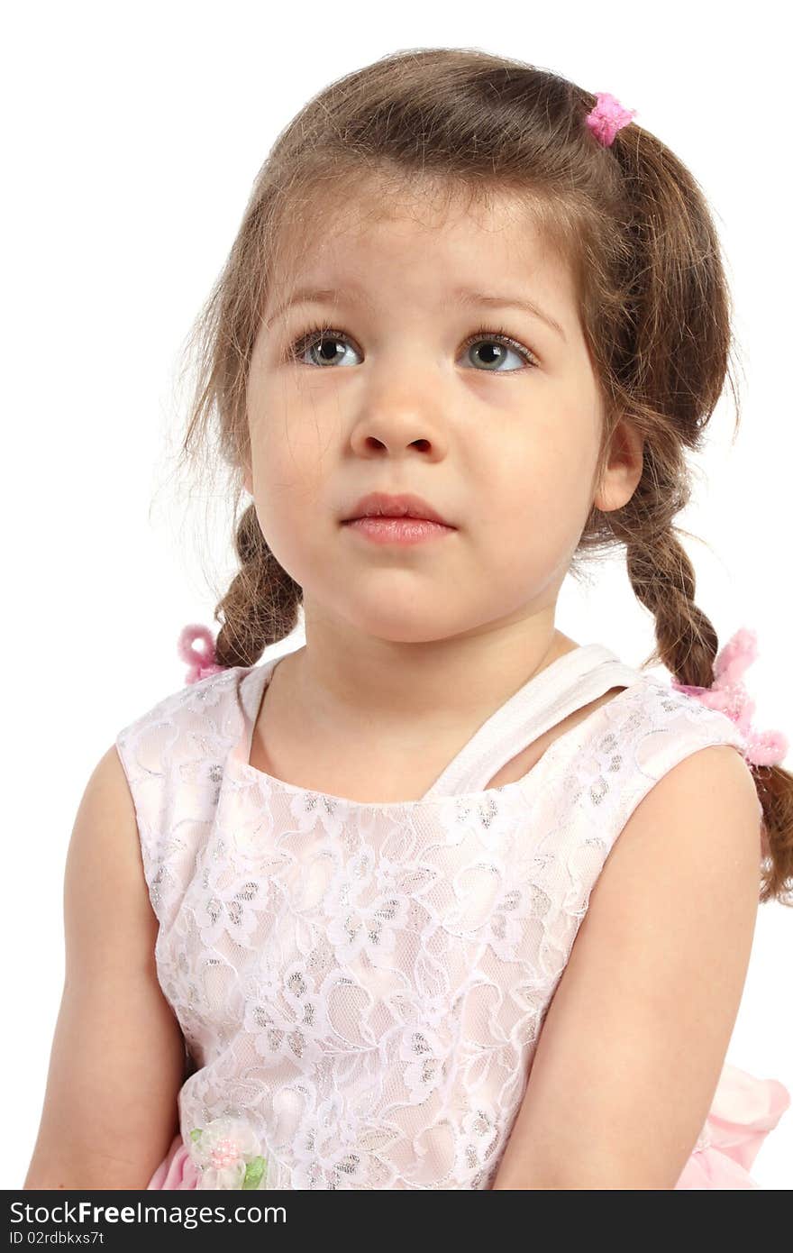 Beautiful little girl with pigtails