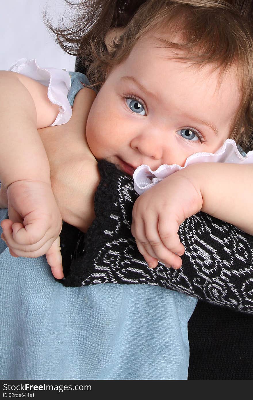 Small child at the hands of his mother and pointing. Small child at the hands of his mother and pointing