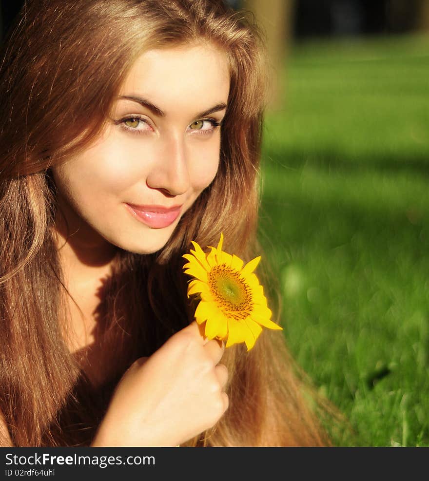 Beautiful girl with yellow flower. Beautiful girl with yellow flower