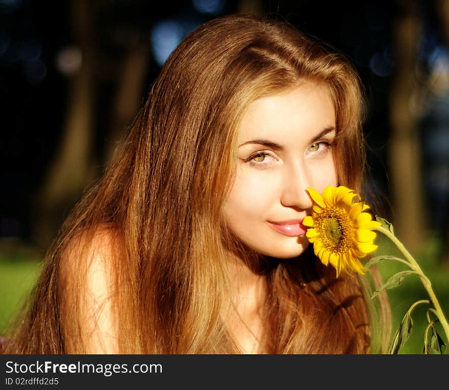 Beautiful girl with yellow flower. Beautiful girl with yellow flower